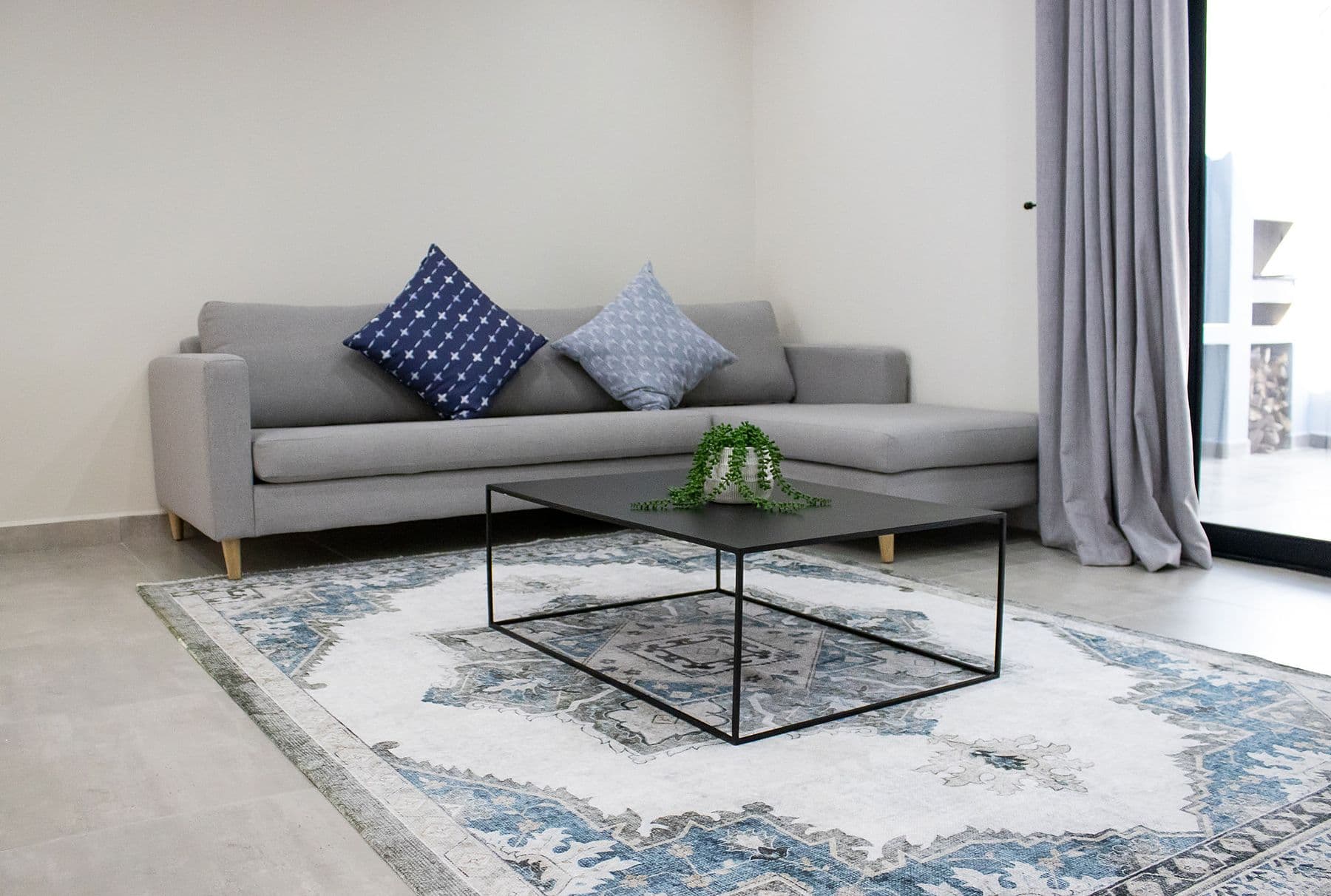 Lounge with patterned rug