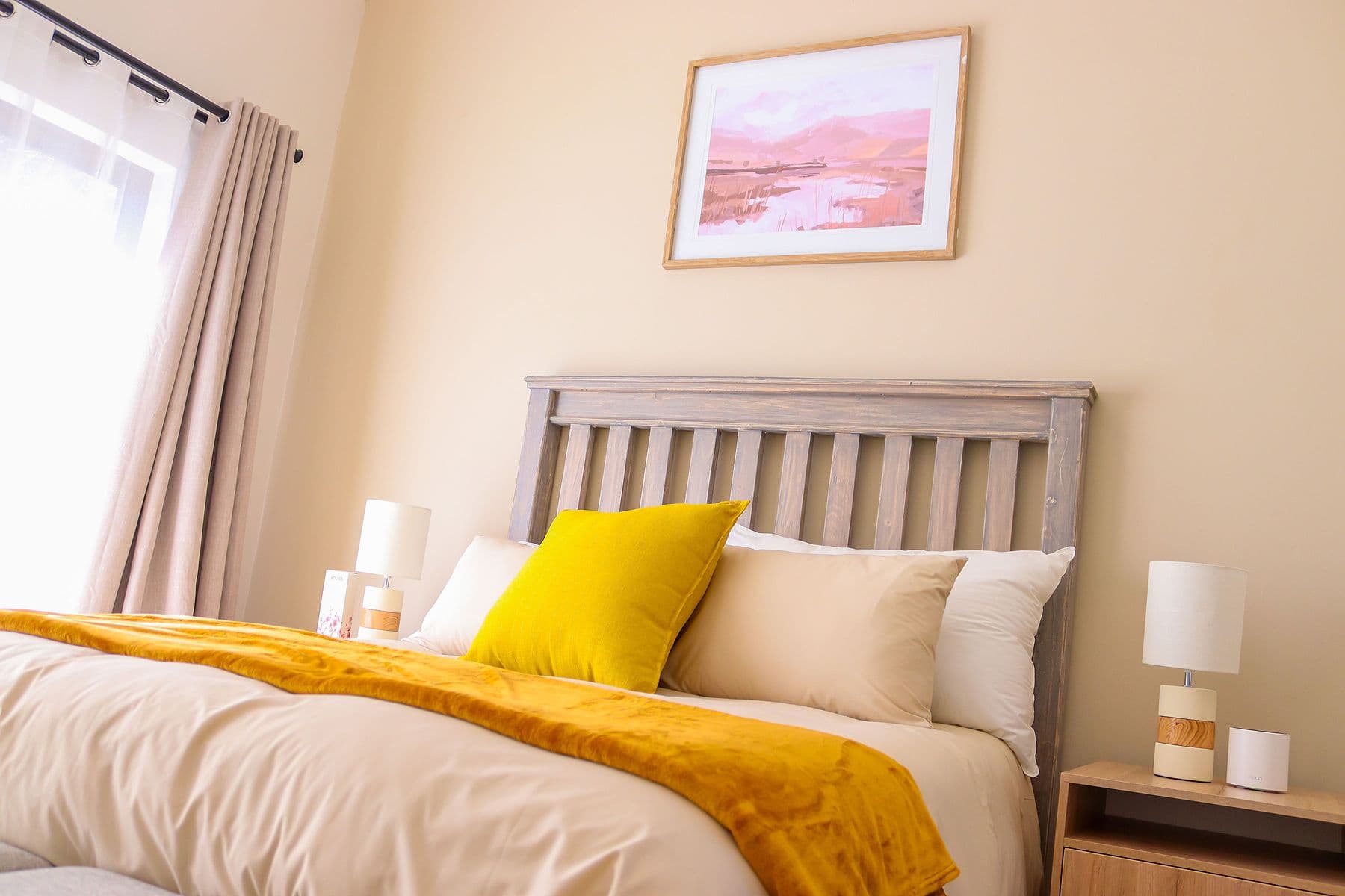 Saffron Room: bed and window light
