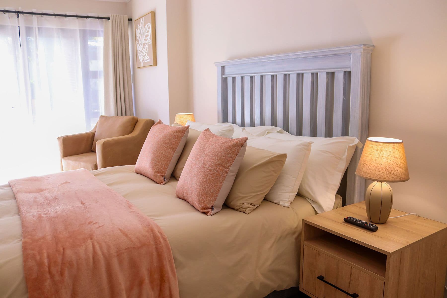 Blush Room: bed with pink cushions