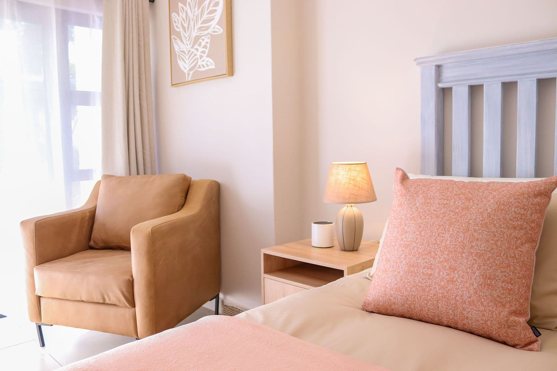 Blush Room: armchair beside the bed